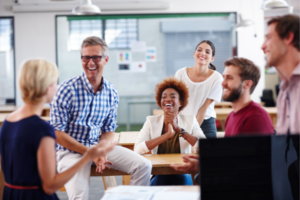 Happy coworkers all talking together